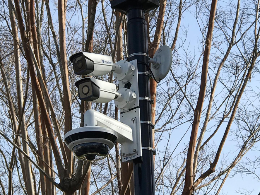 Security cameras installed on pole